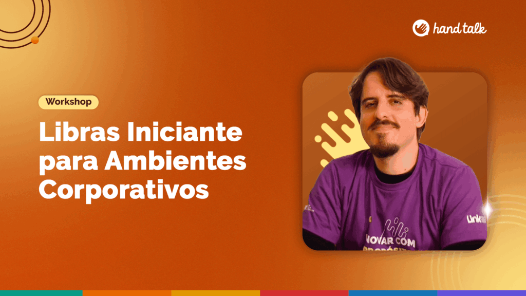 Fundo laranja. Texto Workshop Libras Iniciante para Ambientes Corporativos. Ao lado, fotografia do Darley Goulart, homem branco, de cabelos e barba castanhos, e camiseta roxa. 
